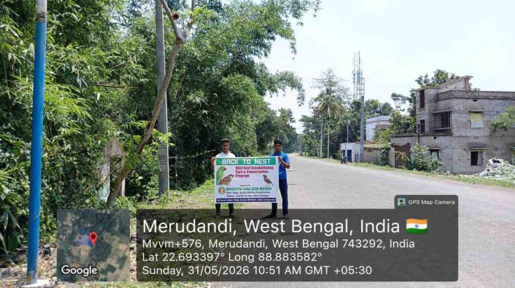 Bharatiya Jana Seva Mission volunteers participating in bird nest installation activities.